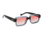 Sunglasses with black frame and red gradient lenses on a white background