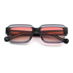 Sunglasses with red-tinted lenses on a white background