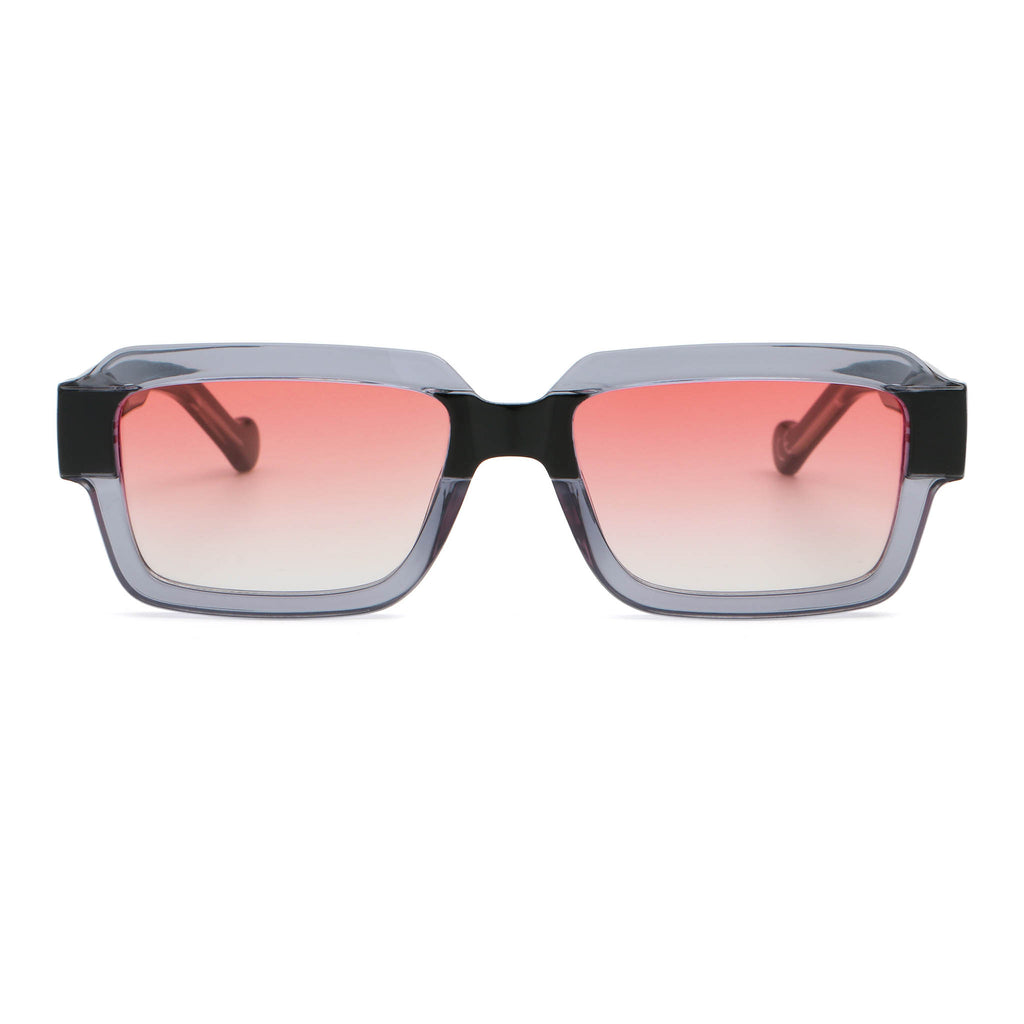Sunglasses with black frame and pink gradient lenses on a white background