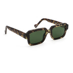 Sunglasses with tortoiseshell frame and green lenses on a white background