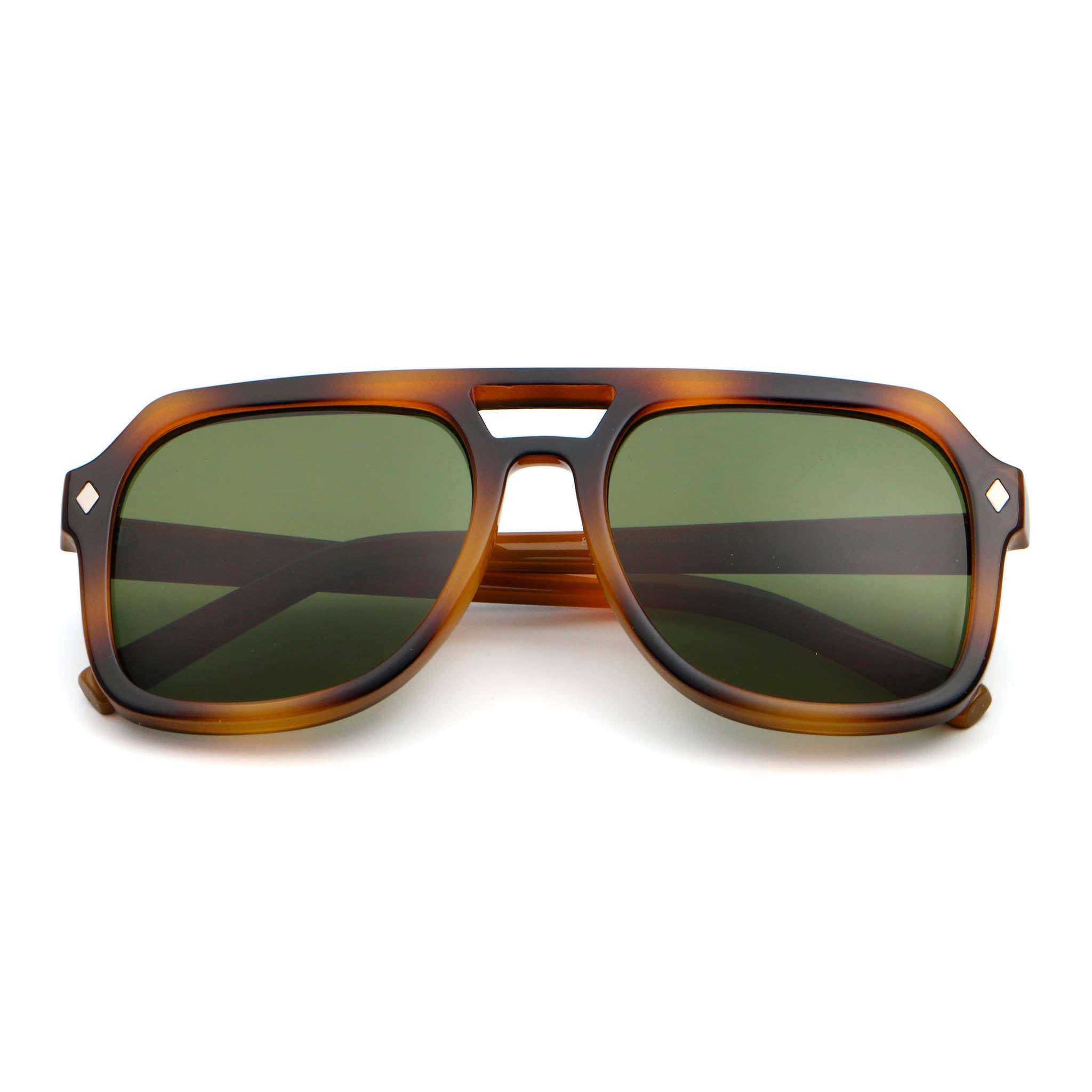 Sunglasses with tortoiseshell frame and green lenses on a white background