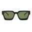 Black sunglasses with green lenses on a white background