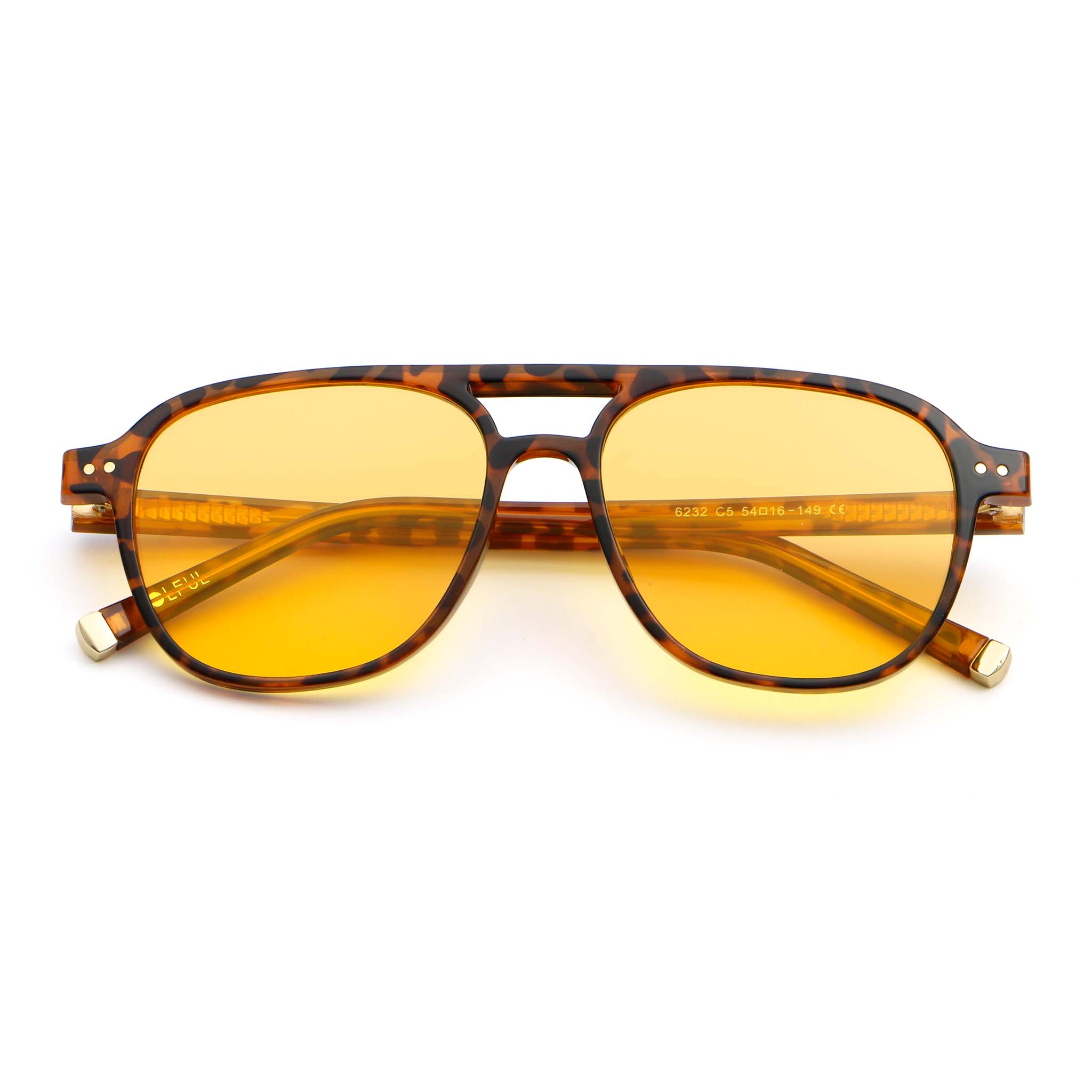 Sunglasses with tortoiseshell frame and yellow lenses on a white background