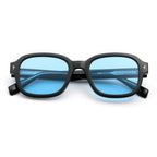 Black colour square frame sunglasses with blue lenses on white background.