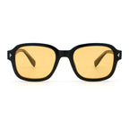 A pair of square-shaped sunglasses with a black frame and yellow lenses.