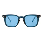 Sunglasses with blue frame and clear blue lenses on a white background.