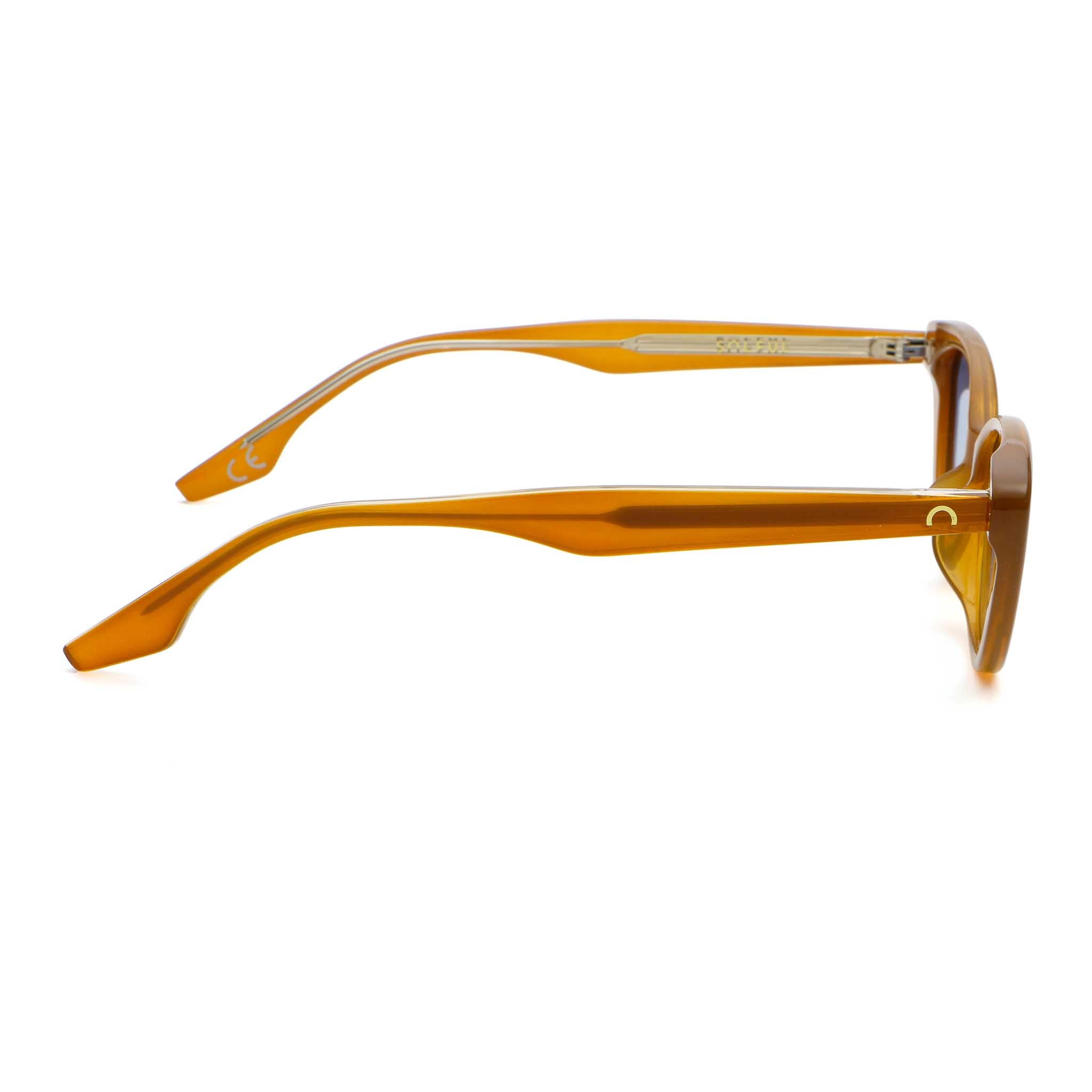 Orange sunglasses with a blue lens on a white background