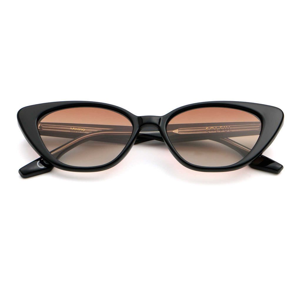 Black frame sunglasses with a pink lens, folded