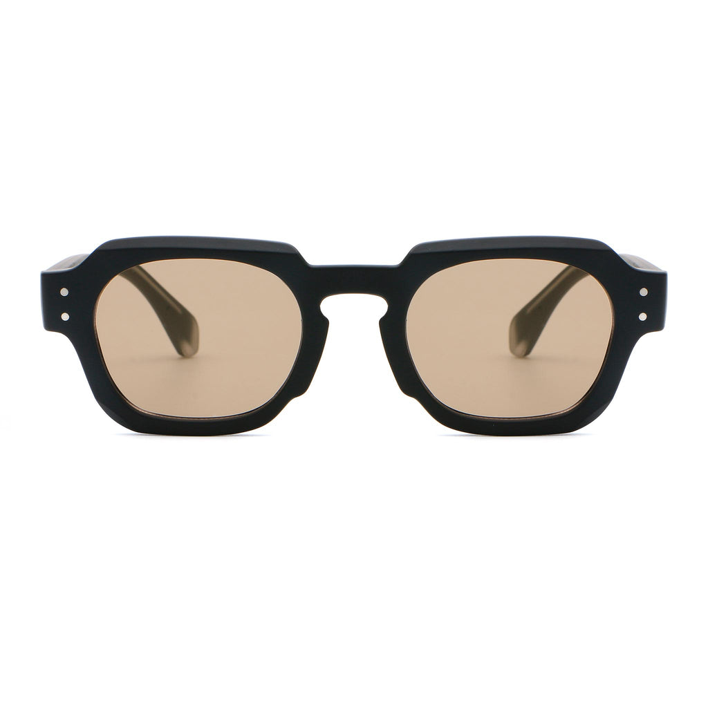 Black sunglasses with brown lenses on a white background