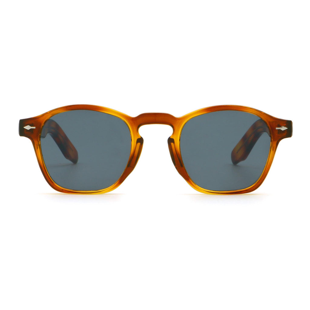 Sunglasses with tortoiseshell frame and dark lenses on a white background