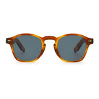 Sunglasses with tortoiseshell frame and dark lenses on a white background