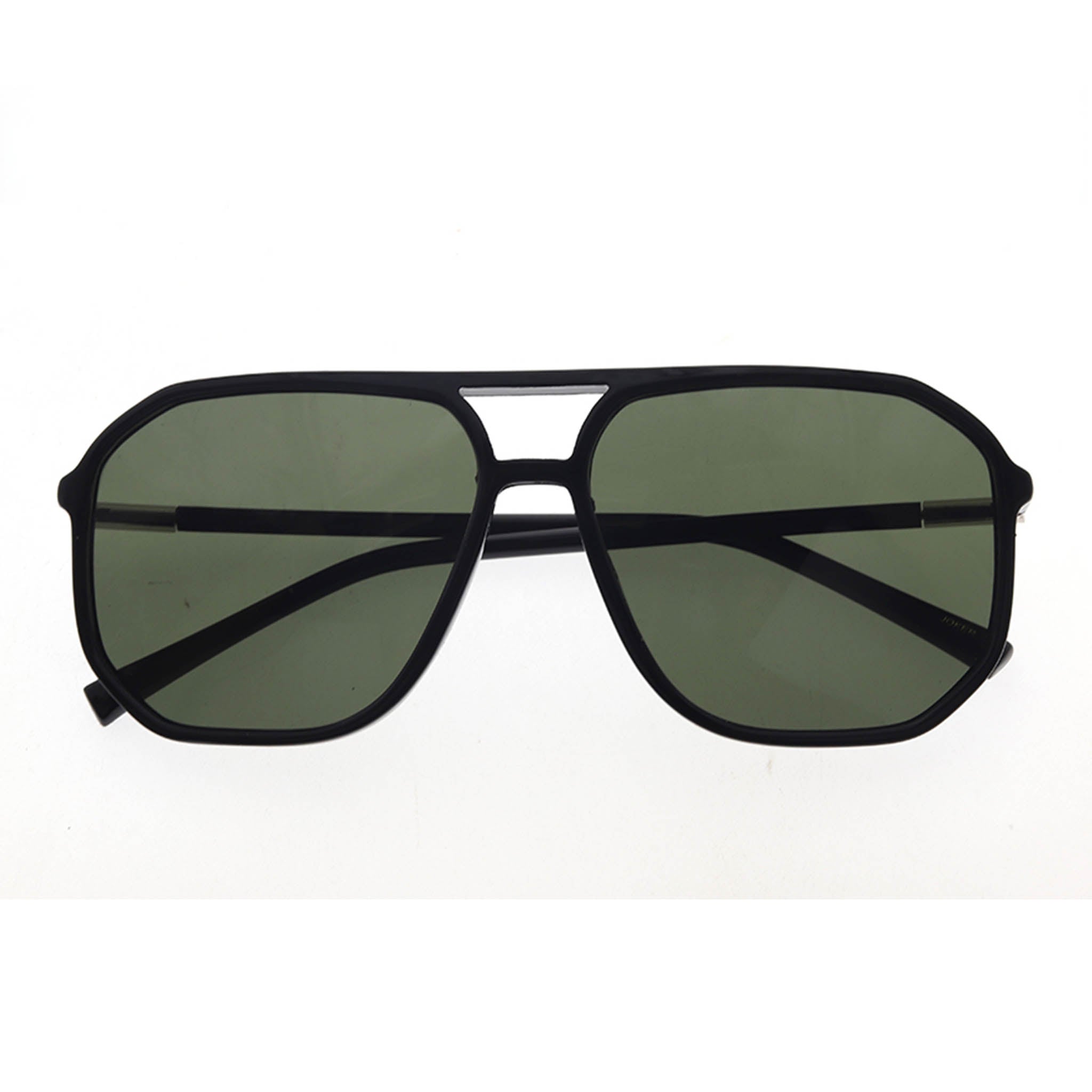 Black sunglasses with green lenses on a white background