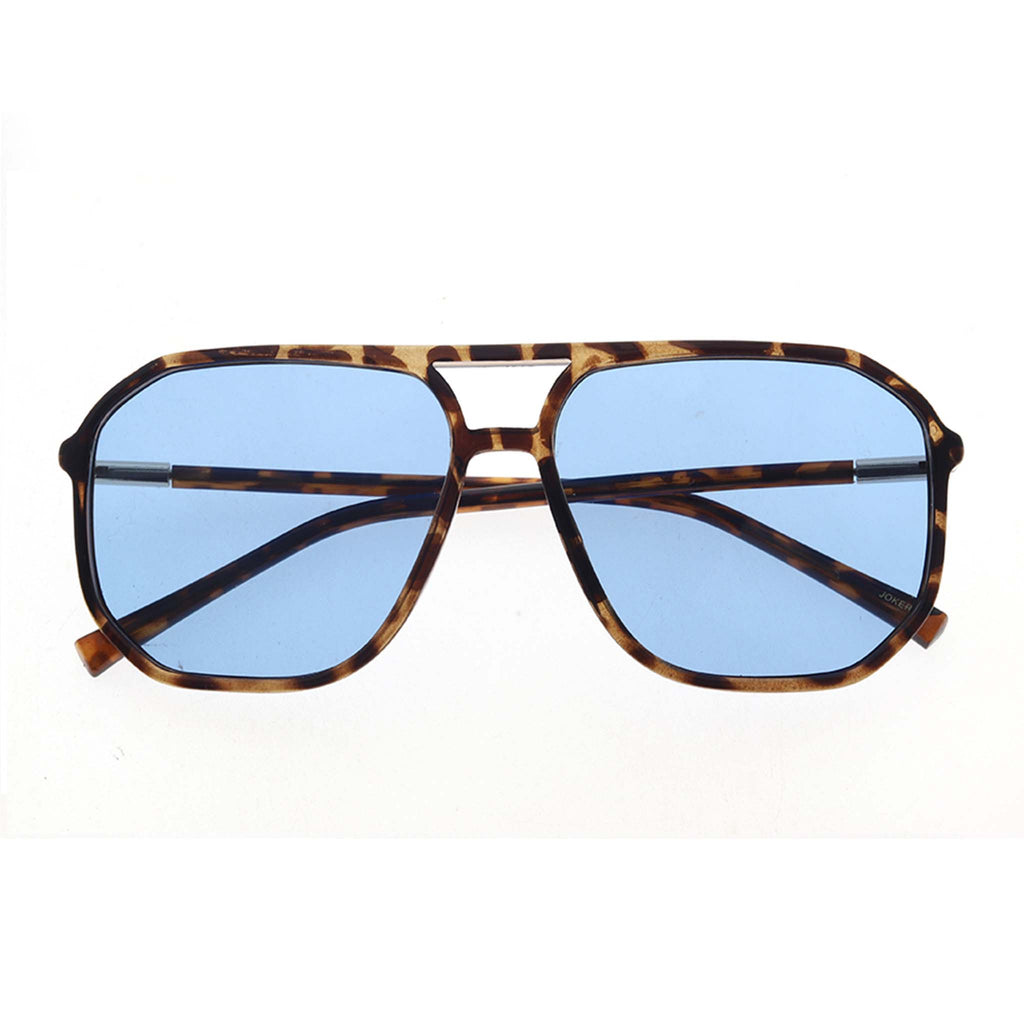 Sunglasses with tortoiseshell frame and blue lenses on a white background