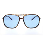 Sunglasses with tortoiseshell frame and blue lenses on a white background