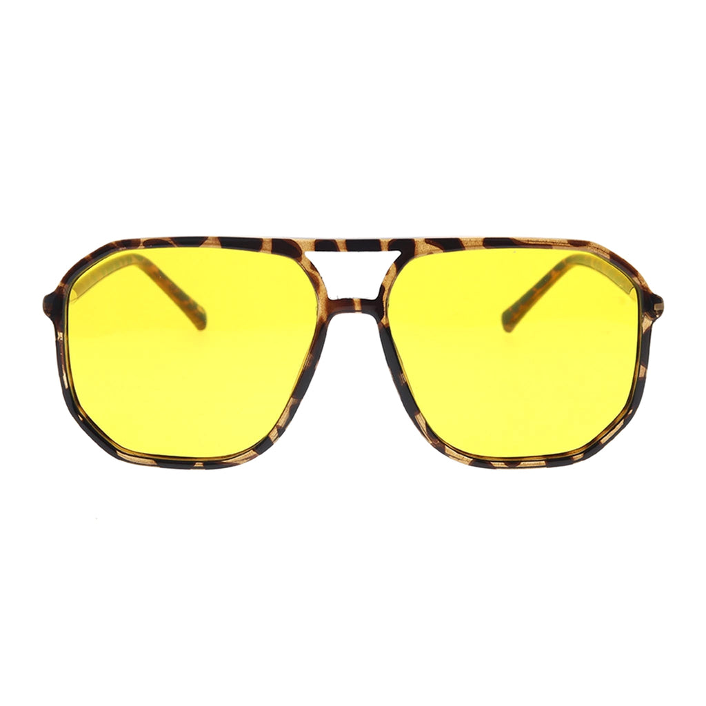 big frame Sunglasses with yellow lenses and tortoiseshell frame on a white background