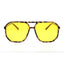 Sunglasses with yellow lenses and tortoiseshell frame on a white background