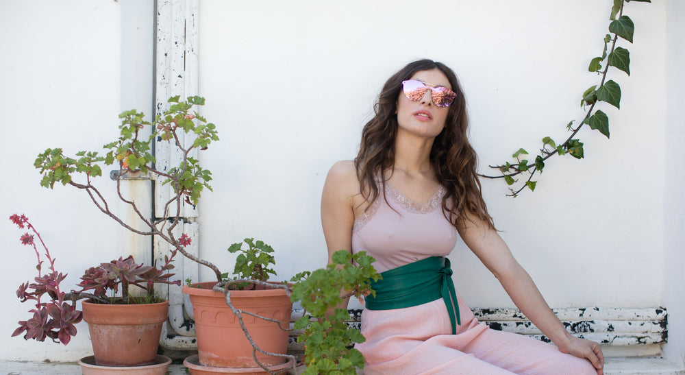 Pink Ibiza weekender sunglasses mirror UV 400 lens worn by ibiza women in dalt villa