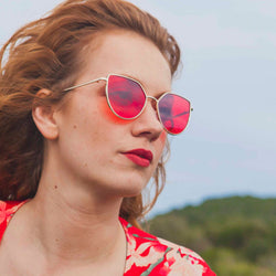 Beautiful redhead liwia in red dress wearing SOLLY metal cat eye sunglasses with red lens